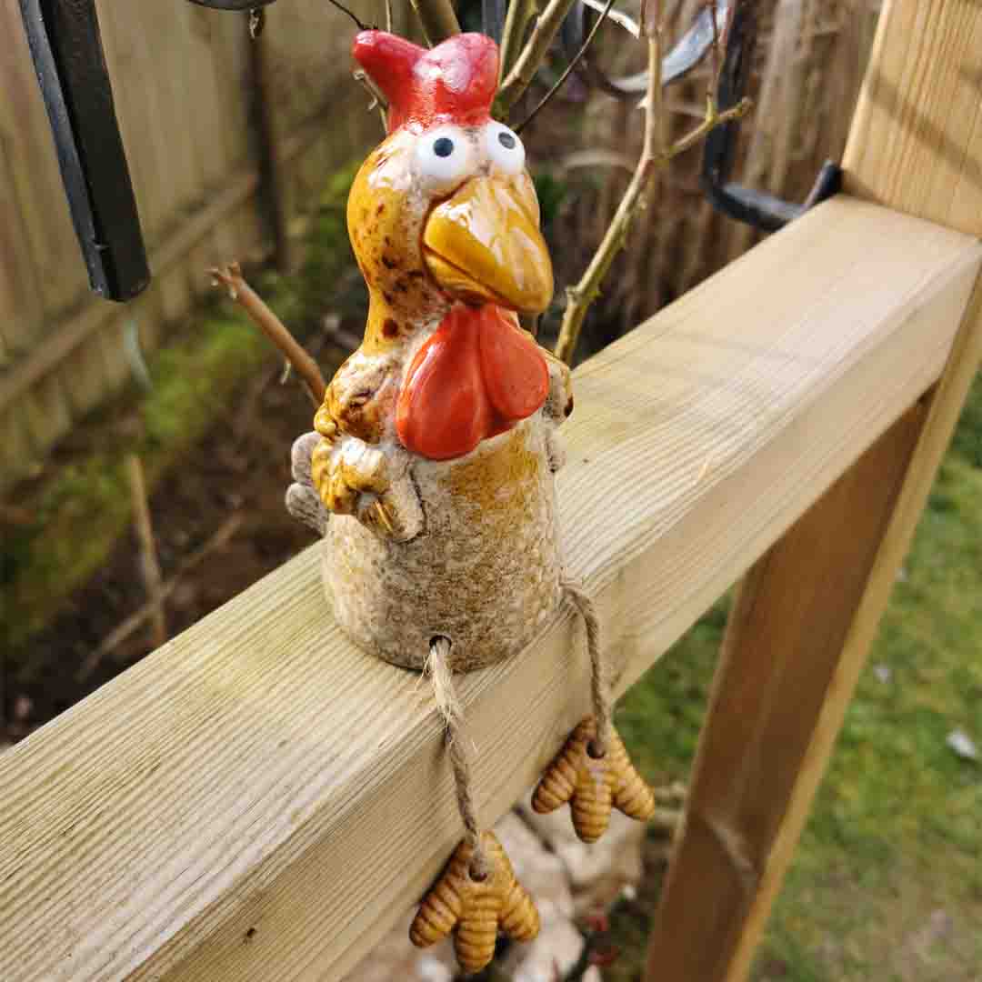 Witziger Kantenhocker Huhn aus Keramik, Bewegliche Beine
